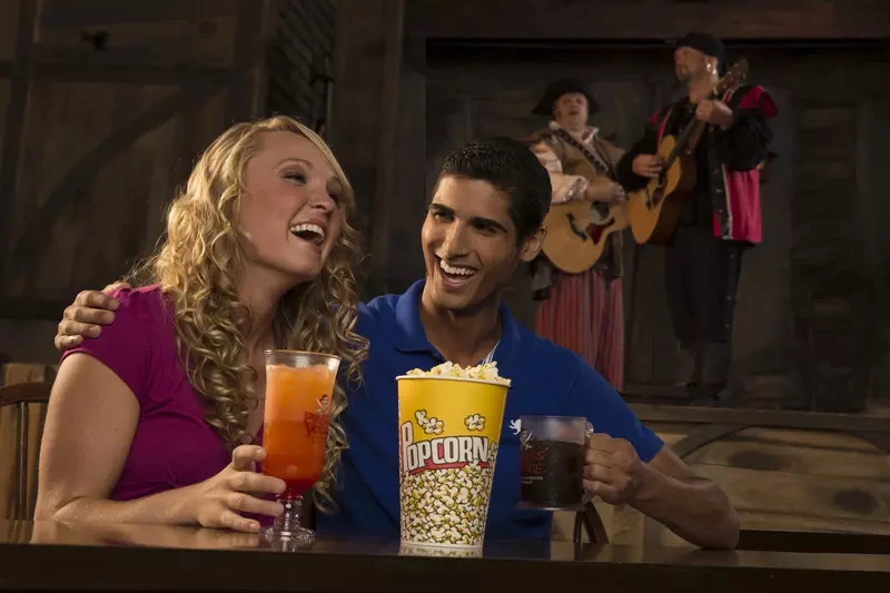 couple enjoying pre-show entertainment
